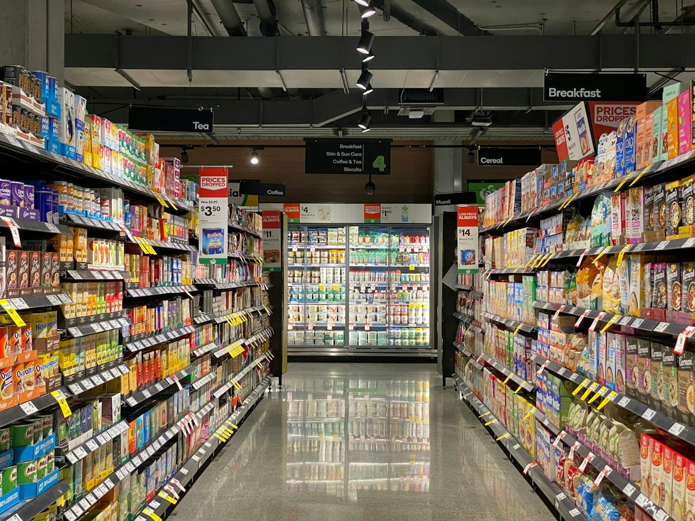 Bright, well-stocked retail shelves in a modern shop